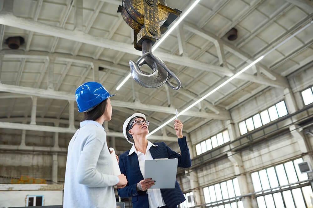 female-building-contractors-visiting-construction--WYFZN2L (1)